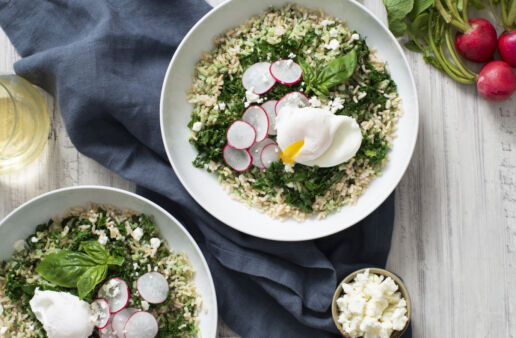 Kale and radish rice bowl with arugula and basil pesto